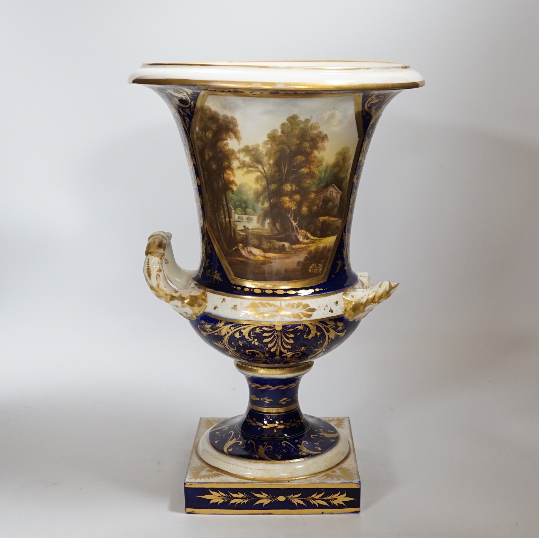 A large Crown Derby campana shaped urn, painted with a view on the river Derwent, circa 1815-20, 33cm